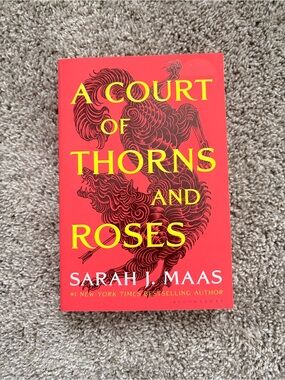 A Court of Thorns and Roses by Sarah J. Maas - Red Cover, Paperback